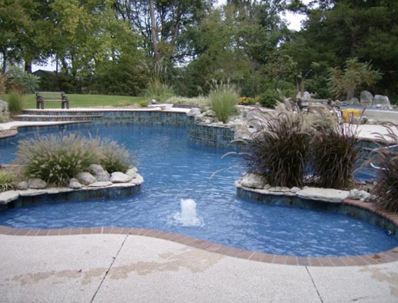 Pool with custom landscaping - Swimming Pools Service & Repair in Abilene, KS