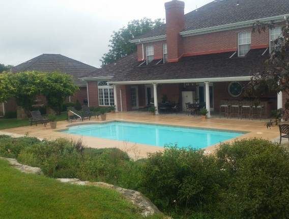 Backyard pool with landscaping - Swimming Pools Service & Repair in Abilene, KS