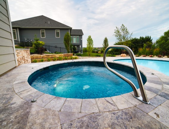 Hot tub with railing - Swimming Pools Service & Repair in Abilene, KS